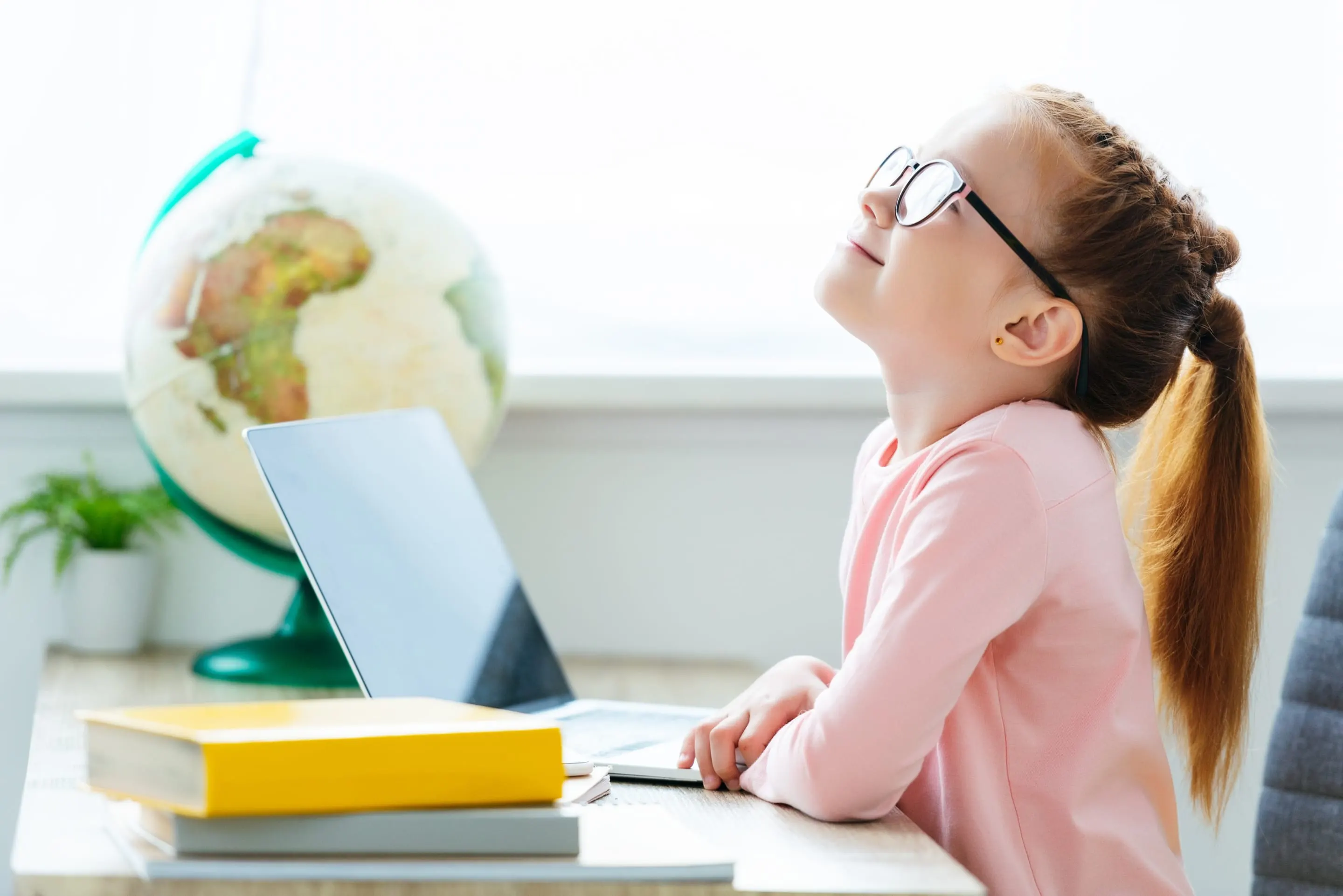 A girl wearing her new glasses